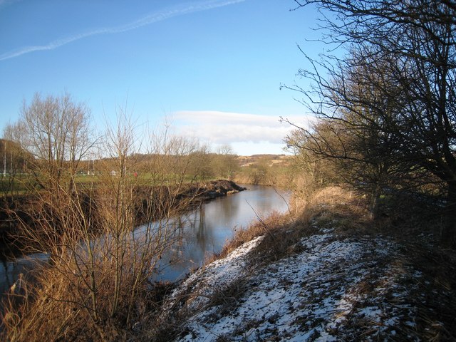 This photograph shows a view of the River Wear near Shincliffe Bridge. A part of Maiden Castle (the University of Durham's sports ground) can be seen on the left-hand side of the image.