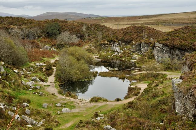 Looking down into Haytor Quarry with Smallacombe Rocks in the middle distance