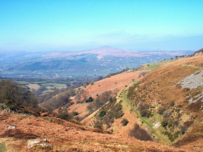 View over the Brecon Beacons with Sugar Loaf on the horizon